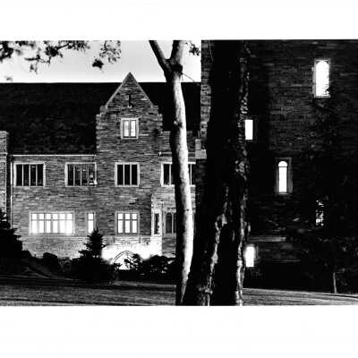 Exterior view of south side of Barbelin building at night.