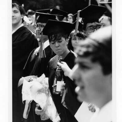 Views of small groups of students during 1985 graduation/commencement on Gest Lawn.
