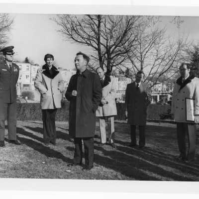 Terrence Toland, S.J., Daniel DeLucca, Lt. Col. Jacobs and others at flag raising ceremony and certificate ceremony celebrating U.S. Bicentennial and 125th anniversary of Saint Joseph's College in 1976.