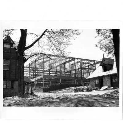 View of Campion under construction with Simpson Hall and carriage house in foreground.