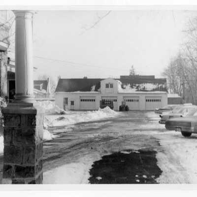 View of Sullivan Hall four car garage in snow.