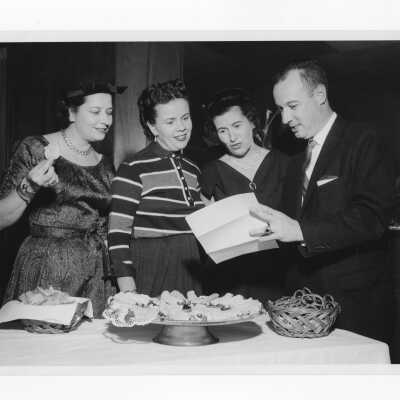 Several wives of alumni association members planning an event, January 5, 1958.