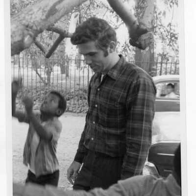 Joseph Daoust, S.J. with elementary students from 17th and Girard neighborhool in Philadelphia on SJC campus (?). This may have been part of SJC Commune outreach effort during summer 1968.