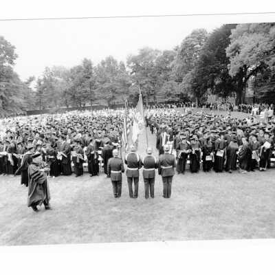 View of graduating students and color guard on Gest Lawn during 1993 graduation/commencement.
