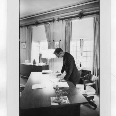 Terrence Toland, S.J., President SJC, working in office.