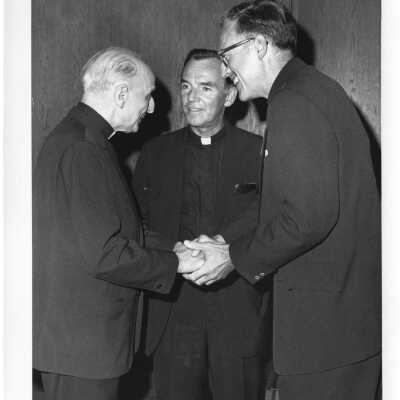 Reception for opening of exhibit, Jesuit Spirit in the Arts, in Boland Hall, July 30, 1976, as part of celebration of 125th anniversary of Saint Joseph's College with Rev. Pedro Arrupe, S.J., Terrence Toland, S.J., and Donald I. MacLean, S.J.