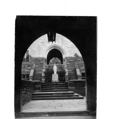 Archway view of memorial to students who died in World War Two [World War II] in Barbelin quandrangle.