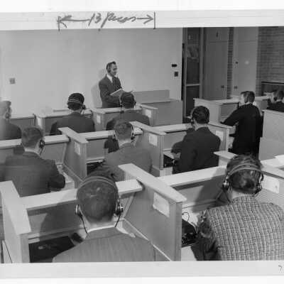 Modern Languages professor, Michael Toconita, with students in language laboratory, May 1961.