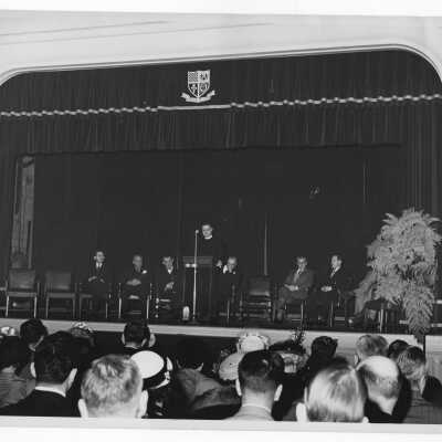 View of Shaffrey award ceremony in Flanigan auditorium with Edward G. Jacklin, S.J., Frank Tucker, Pascal Lucchesi, Louis H. Clerf, Eugene J. Garvin, Joseph W. Post, Robert G. Cranage, March 30, 1952. Louis H. Clerf, recipient.
