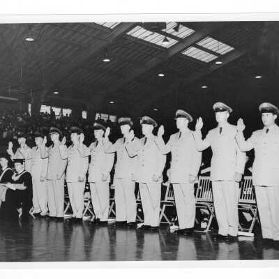 Commissioning of Air Force ROTC students during 1958 graduation/commencement ceremony.