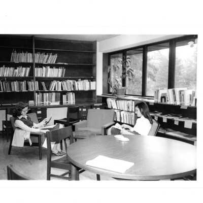 Two women studying in Campbell Library, Academy of Food Marketing, Villiger (later Post).