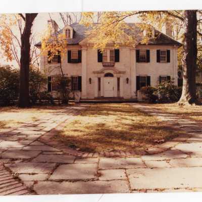 Exterior view of front of Bronstein Hall in autumn.