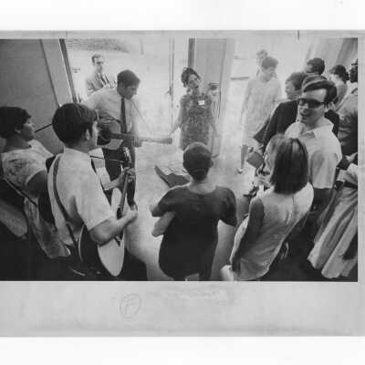 Pax Romana's 20th World Plenary Assembly meets at Saint Joseph's College, August 1968. Group of guitarists and singers practice before liturgy.