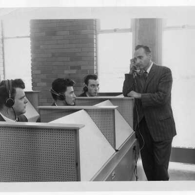 Modern Languages professor, Michael Toconita, with students in language laboratory, May 1961.
