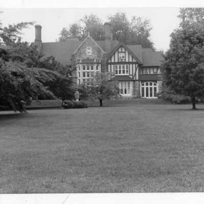Exterior view of Saint Mary's Hall with statue of Mary in front.