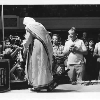 Mother Teresa at bread breaking ceremony during International Eucharistic Congress, symposium on hunger, August 2, 1976, held at Philadelphia Civic Center.