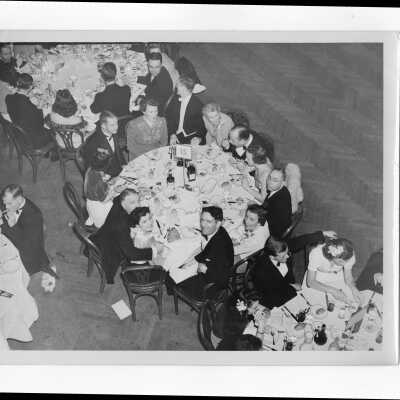 Alumni association members dining at formal supper dance, c. 1939.