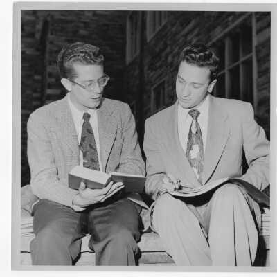 Two students, Milton Connell and Filindo DiGiacobbe, preparing for presentation of Horatian Actus (Odes of Horace) during centennial celebration. Event held on October 26, 1951. See article in The Hawk, October 25, 1951, page 1.