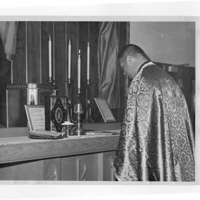 Father Losten of the Byzantine Rite at mass during Saint Joseph's week, March 1964.