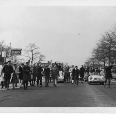 Student booster club pep rally/car parade down City Avenue.