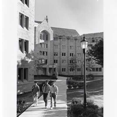 Students walking in front of McShain Hall main entrance.