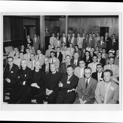 View of Saint Joseph's College Alumni Board of Governors and their guests druing quarterly meeting, September 19, 1955. Included is Joseph S. Hogan, S.J.