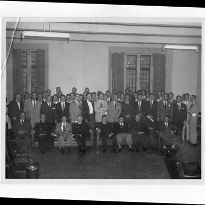 View of Saint Joseph's College Alumni Board of Governors and their guests after quarterly meeting, September 28, 1953. Includes Francis J. Emory, S.J., Edward G. Jacklin, S.J., Joseph Hogan, S.J., and Joseph F. McNamara, S.J., W. F. Ariano, and others