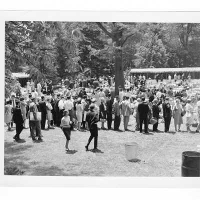 Outdoor reception on lawn following baccalaureate Mass during 1966 graduation/commencement.