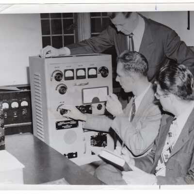 Physics students, William Pallies, and S. Thomas Workman, in laboratory with George Boyden, 1948.