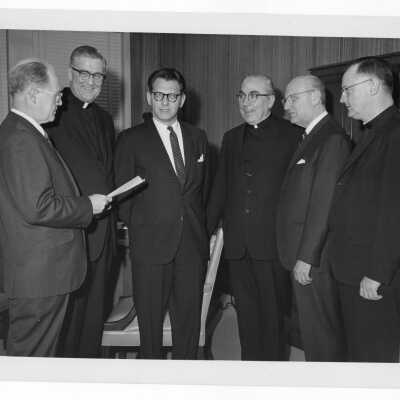 Photo of some individuals attending First Annual Institute on Catholic-Jewish relations, including William F. Maloney,S.J., Rabbi Marc Tanenbaum, Bishop John Graham, Milton Himmelfarb, Msgr. George Higgins March 5-6, 1967.