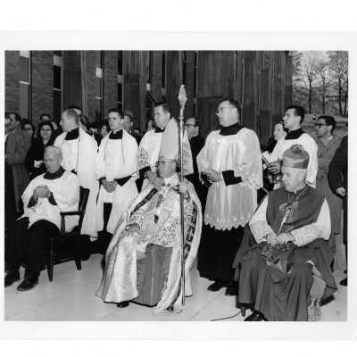 Bellarmine dedication with J. Joseph Bluett, S.J., Rev. Egidio Vagnozzi, and Rev. Joseph McShea and others.