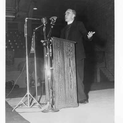 Leo C. Brown, S.J.,(St. Louis University) speaking at labor symposium on industrial relations held October 26, 1951 in Flanigan Auditorium during centennial celebration.