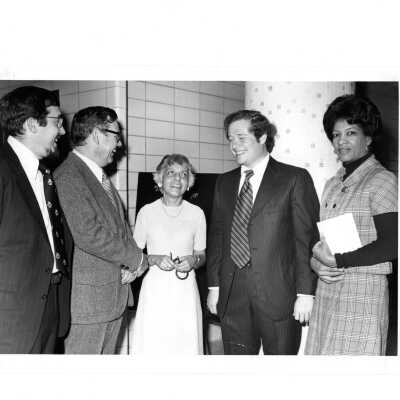 Interior view of Drexel Library with Josephine Savaro and others.