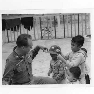 U.S. soldier playing with Vietnamese children, Vietnam Orphanage project.