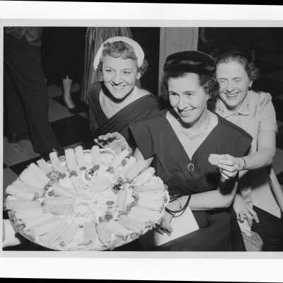 Several wives of alumni association members planning an event, January 5, 1958.