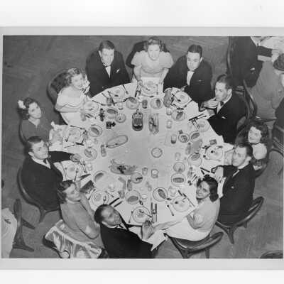 Alumni association members dining at formal supper dance, c. 1939.