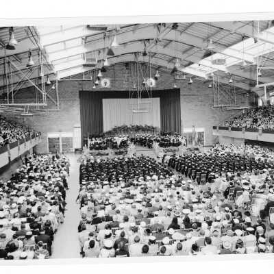 Interior view of 1956 graduation/commencement ceremony in Field House.