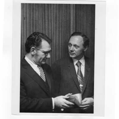 Rabbi Marc Tanenbaum and another individual examining ancient book during Third Institute on Catholic -Jewish Relations, March 2, 1971.