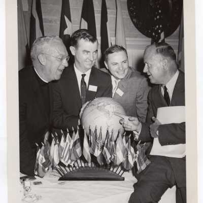 Photo of several individuals attending luncheon sponsored by Latin American Studies Institute to honor J. Peter Grace and to close its first year, June 9, 1961. Pictured are J. Joseph Bluett, S.J., James J. O'Connor, Milton Shapp, J. Peter Grace.