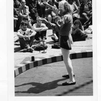 Member of Royal Lichtenstein Circus performing before students.