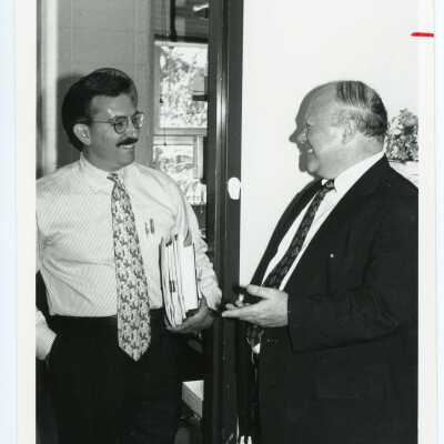 Gregory Dell'Omo: Faculty, Business; Vice President for External Affairs speaking with Joseph M. Ragan: Faculty Accounting