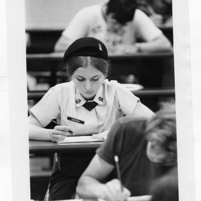 View of female Air Force ROTC student during class, c. 1970.