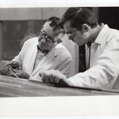 Student and professor in glass blowing course offered by Chemistry Department, c. 1965.