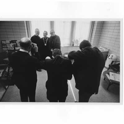 Inauguration of President Terrence Toland, S.J., November 14, 1968. Before ceremony, Toland poses with James H.J. Tate and Gaylord P. Harnwell during picture-taking session.