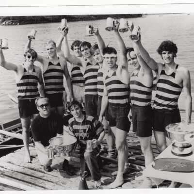 Members of men's crew/rowing team with Dad Vail Regatta trophy, 1970.