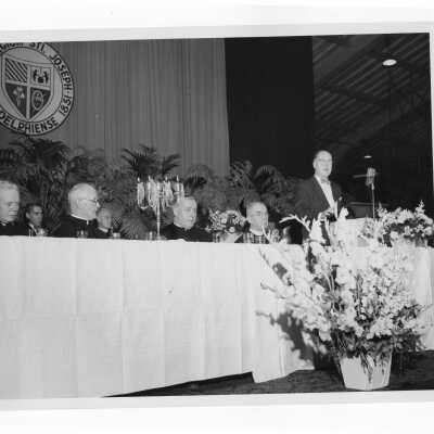 Testimonial dinner for Joseph S. Hogan, S.J., May 26, 1957, with James E. Gallagher, Jr., and Bisohp Joseph McShea.