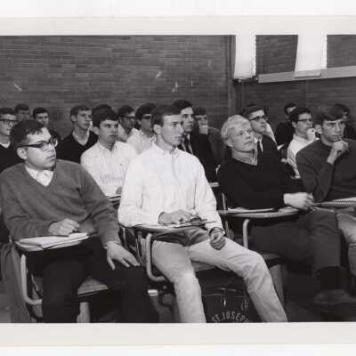 View of students listening to chemistry lecture in classroom, March 11, 1968.