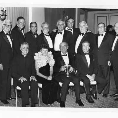 Donald I. MacLean, S.J. with alumni and 1984 Shield of Loyola Award recipient, John (Jack) Ramsey and Mrs. Jack Ramsey.