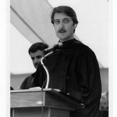 Faculty member at 1985 graduation/commencement.