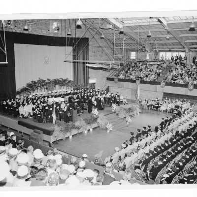 Interior view of 1956 graduation/commencement ceremony in Field House.